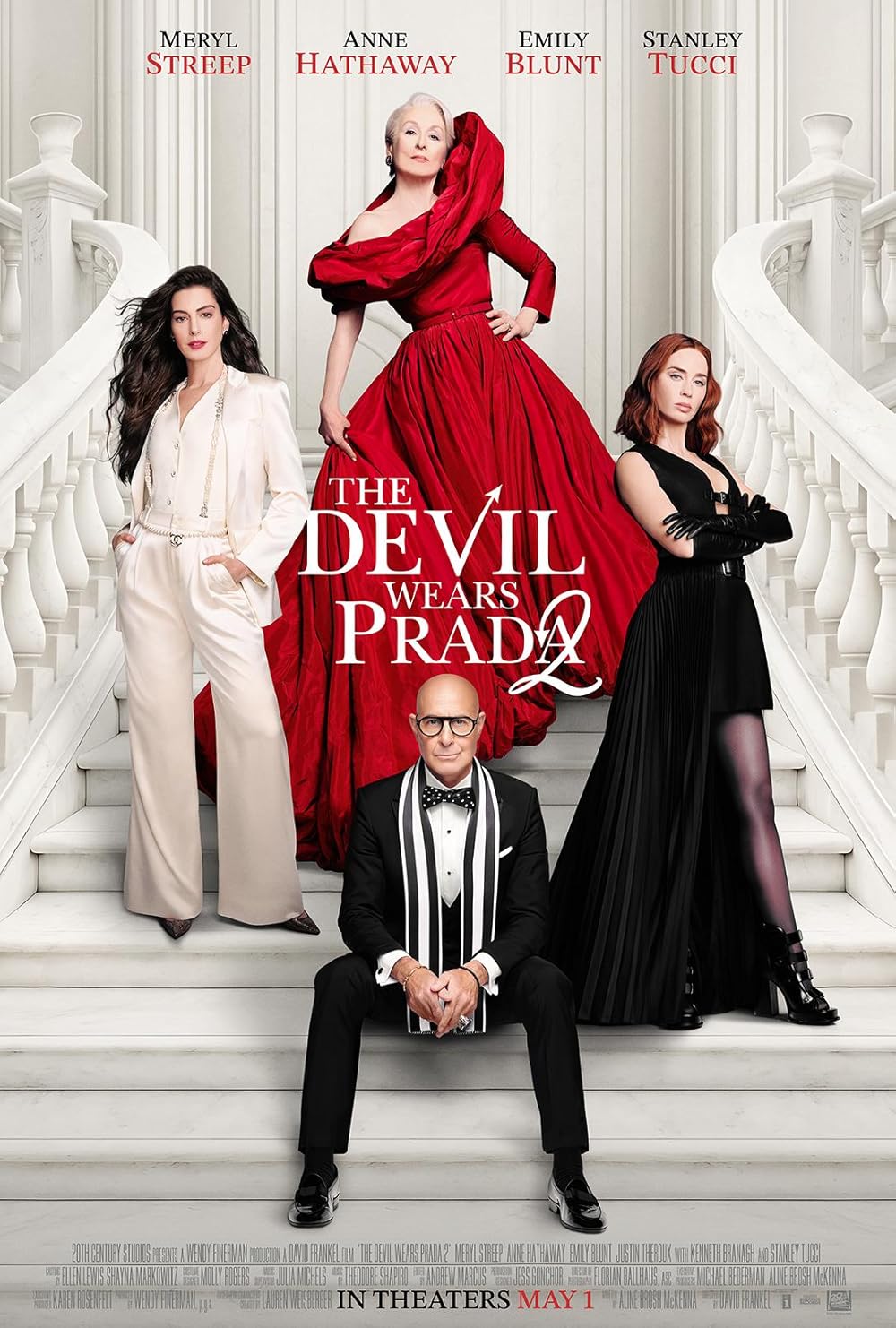 Four Actors - Three of them are standing on the white staircase. One actor is sitting on the white staircase.