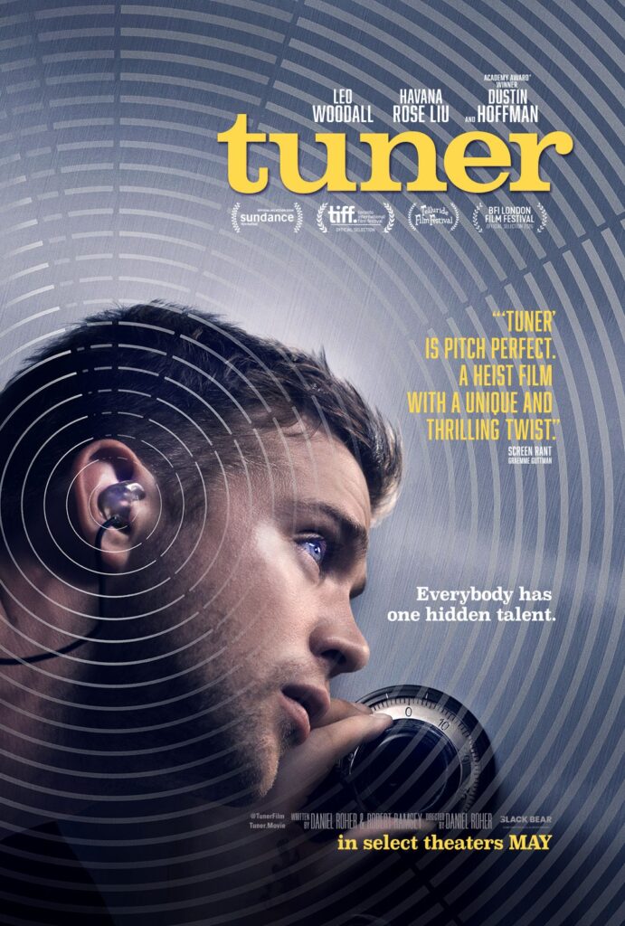 An actor is using the bluetooth earpiece and a piece, listening...