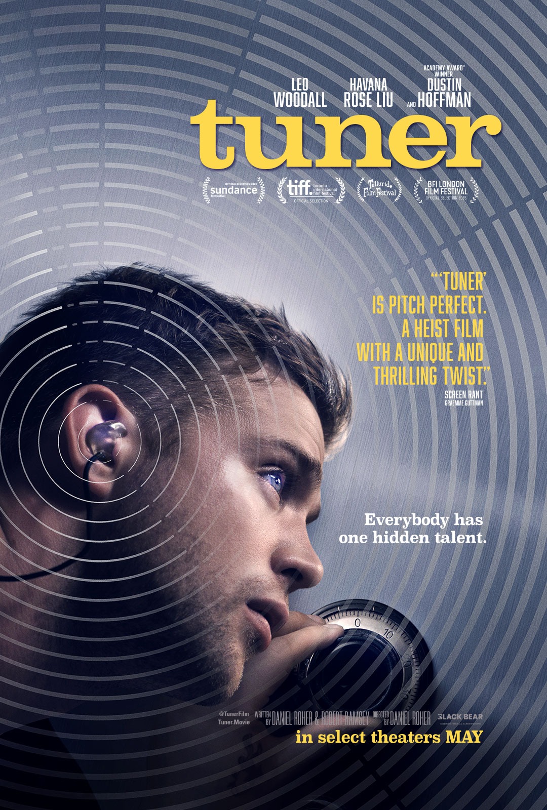 An actor is using the bluetooth earpiece and a piece, listening...